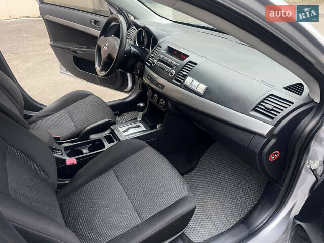 Сірий Міцубісі Lancer, об'ємом двигуна 1.5 л та пробігом 177 тис. км за 5999 $, фото 9 на Automoto.ua