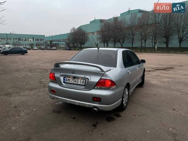 Сірий Міцубісі Lancer, об'ємом двигуна 1.6 л та пробігом 254 тис. км за 3800 $, фото 4 на Automoto.ua