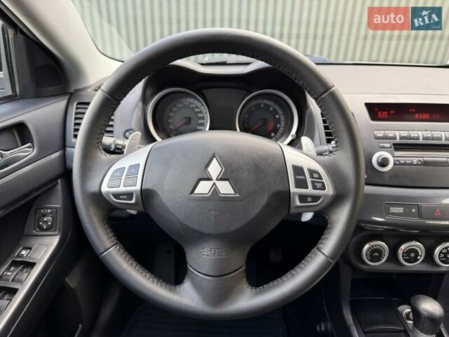 Серый Мицубиси Лансер, объемом двигателя 2 л и пробегом 230 тыс. км за 6900 $, фото 34 на Automoto.ua