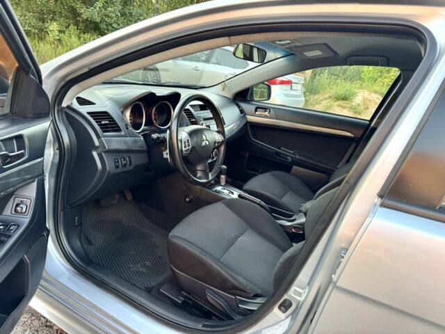 Сірий Міцубісі Lancer, об'ємом двигуна 2 л та пробігом 223 тис. км за 6890 $, фото 9 на Automoto.ua