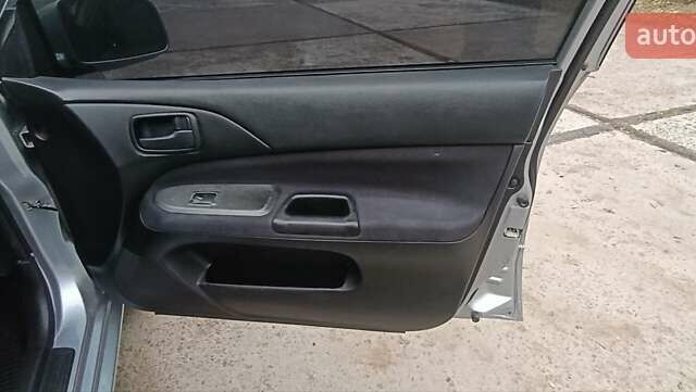 Сірий Міцубісі Lancer, об'ємом двигуна 1.6 л та пробігом 176 тис. км за 4999 $, фото 30 на Automoto.ua