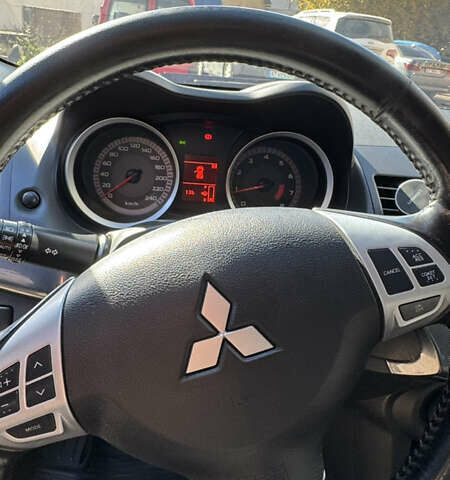 Серый Мицубиси Лансер, объемом двигателя 2 л и пробегом 190 тыс. км за 6900 $, фото 15 на Automoto.ua