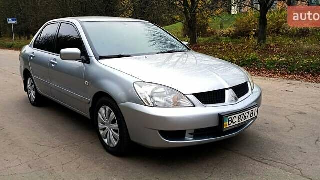 Серый Мицубиси Лансер, объемом двигателя 1.58 л и пробегом 176 тыс. км за 5000 $, фото 8 на Automoto.ua