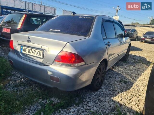 Сірий Міцубісі Lancer, об'ємом двигуна 1.6 л та пробігом 240 тис. км за 2999 $, фото 6 на Automoto.ua