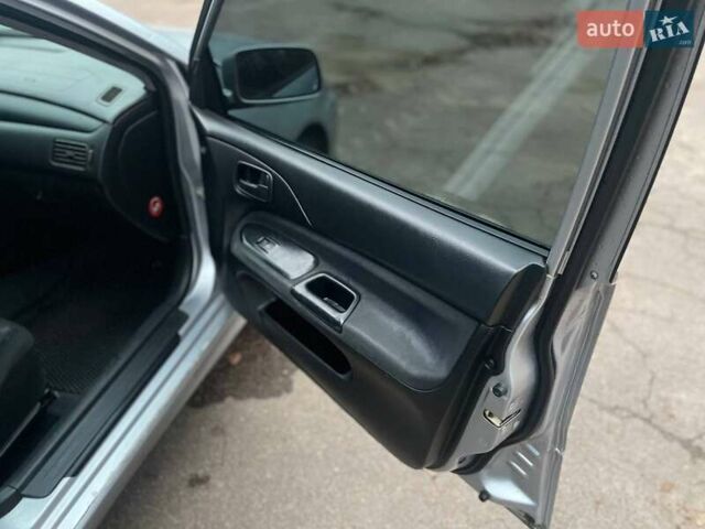 Сірий Міцубісі Lancer, об'ємом двигуна 1.6 л та пробігом 254 тис. км за 3800 $, фото 14 на Automoto.ua