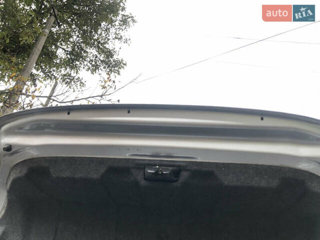 Сірий Міцубісі Lancer, об'ємом двигуна 1.58 л та пробігом 240 тис. км за 4299 $, фото 26 на Automoto.ua