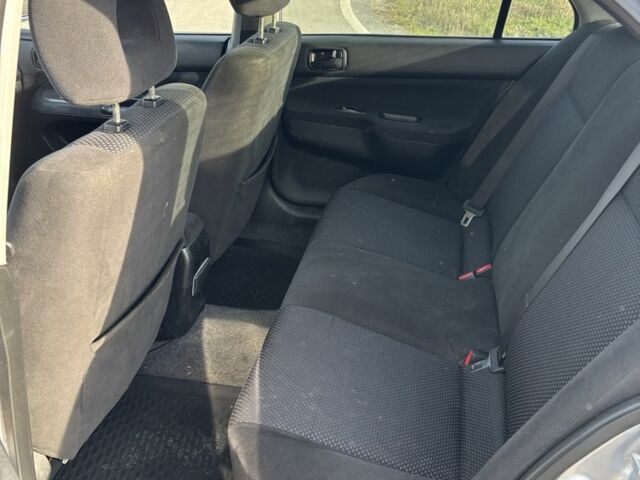 Серый Мицубиси Лансер, объемом двигателя 1.6 л и пробегом 228 тыс. км за 4500 $, фото 6 на Automoto.ua