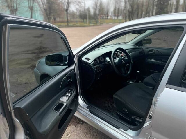 Сірий Міцубісі Lancer, об'ємом двигуна 1.6 л та пробігом 254 тис. км за 3800 $, фото 11 на Automoto.ua