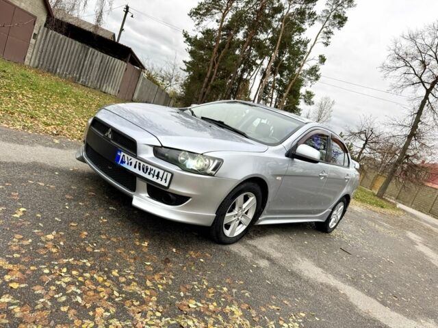 Серый Мицубиси Лансер, объемом двигателя 2 л и пробегом 225 тыс. км за 6890 $, фото 2 на Automoto.ua