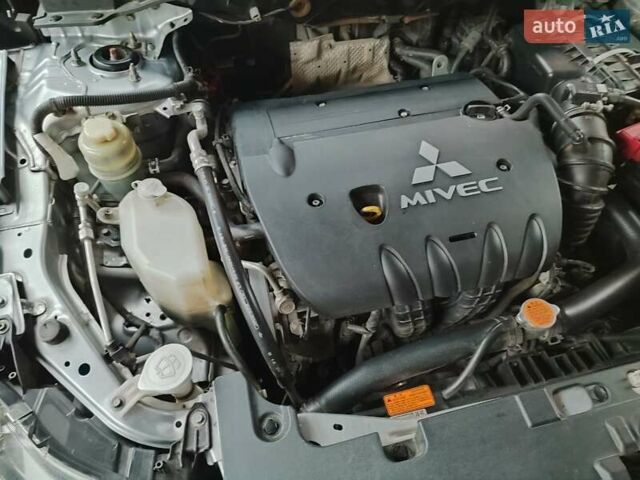 Серый Мицубиси Лансер, объемом двигателя 2 л и пробегом 234 тыс. км за 7200 $, фото 11 на Automoto.ua