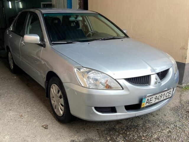 Сірий Міцубісі Lancer, об'ємом двигуна 1.6 л та пробігом 196 тис. км за 4700 $, фото 4 на Automoto.ua