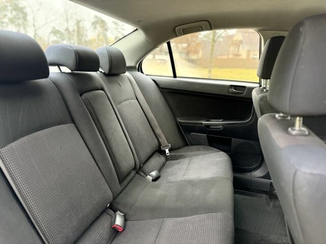 Сірий Міцубісі Lancer, об'ємом двигуна 2 л та пробігом 265 тис. км за 5300 $, фото 19 на Automoto.ua