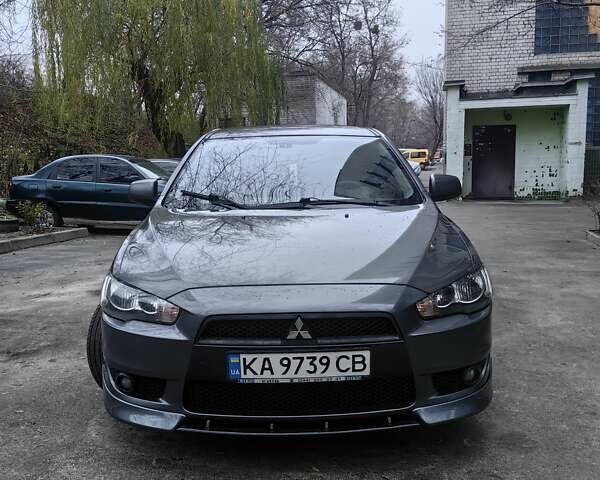 Сірий Міцубісі Lancer, об'ємом двигуна 2 л та пробігом 186 тис. км за 6000 $, фото 2 на Automoto.ua