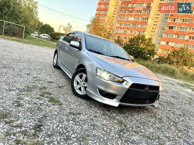 Сірий Міцубісі Lancer, об'ємом двигуна 2 л та пробігом 223 тис. км за 7390 $, фото 7 на Automoto.ua