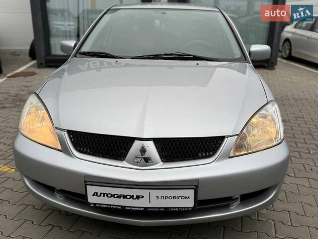 Сірий Міцубісі Lancer, об'ємом двигуна 1.6 л та пробігом 206 тис. км за 4799 $, фото 10 на Automoto.ua
