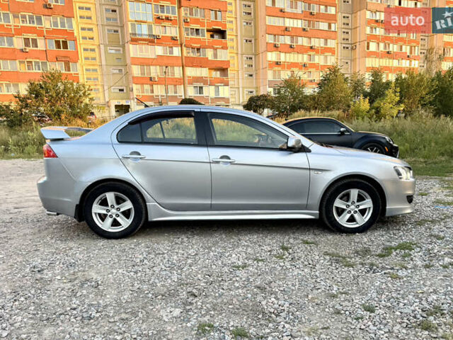 Сірий Міцубісі Lancer, об'ємом двигуна 2 л та пробігом 223 тис. км за 7390 $, фото 6 на Automoto.ua