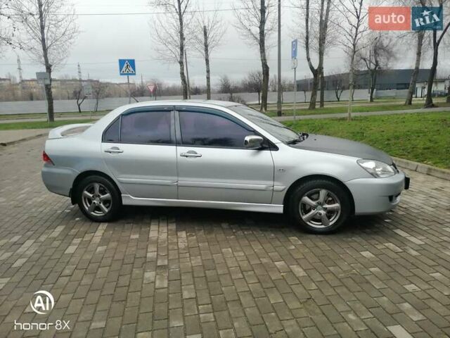 Сірий Міцубісі Lancer, об'ємом двигуна 1.6 л та пробігом 225 тис. км за 5200 $, фото 4 на Automoto.ua