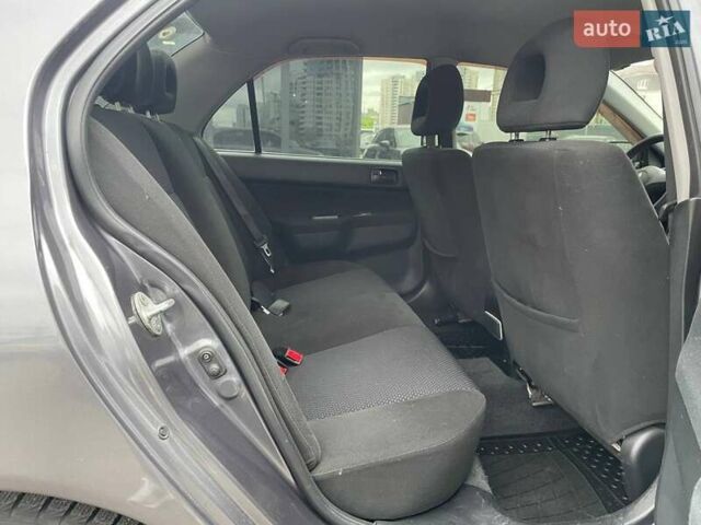 Серый Мицубиси Лансер, объемом двигателя 1.58 л и пробегом 146 тыс. км за 5490 $, фото 10 на Automoto.ua