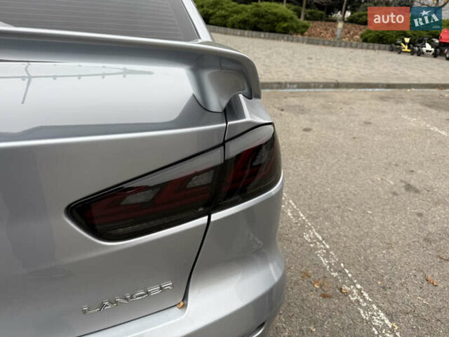 Сірий Міцубісі Lancer, об'ємом двигуна 2 л та пробігом 253 тис. км за 8700 $, фото 17 на Automoto.ua