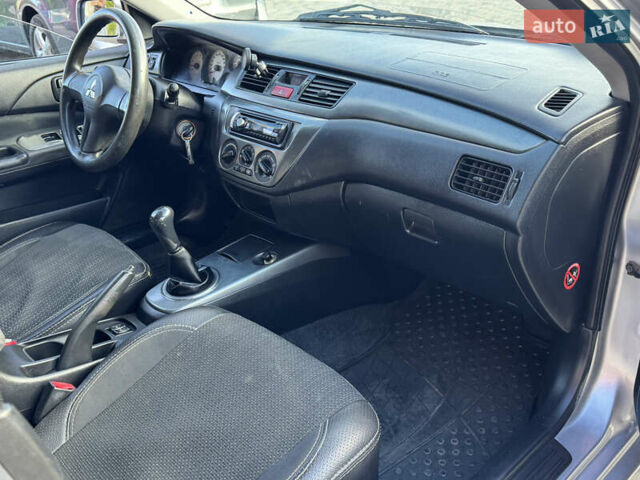 Мицубиси Лансер 2008 в Одессе на Automoto.ua Серый Мицубиси Лансер, объемом двигателя 1.6 л и пробегом 221 тыс. км за 3700 $, фото 19 на Automoto.ua