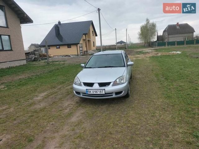 Сірий Міцубісі Lancer, об'ємом двигуна 1.6 л та пробігом 174 тис. км за 4100 $, фото 1 на Automoto.ua