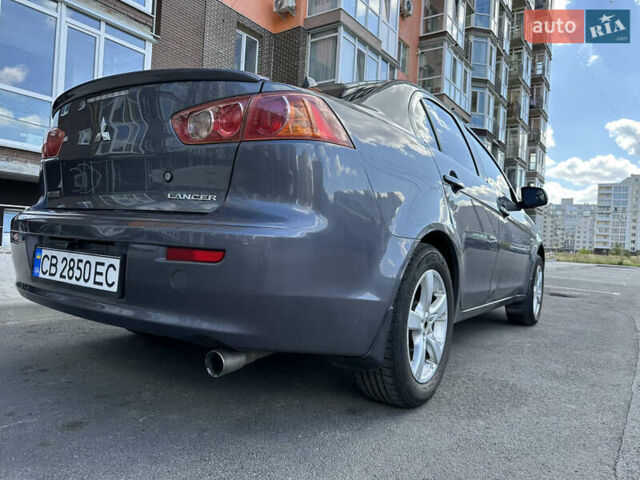 Сірий Міцубісі Lancer, об'ємом двигуна 1.5 л та пробігом 200 тис. км за 6600 $, фото 4 на Automoto.ua