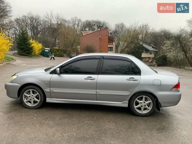 Мицубиси Лансер 2008 в Владимир-Волынский на Automoto.ua Серый Мицубиси Лансер, объемом двигателя 1.4 л и пробегом 268 тыс. км за 3700 $, фото 9 на Automoto.ua