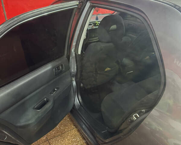 Серый Мицубиси Лансер, объемом двигателя 1.6 л и пробегом 268 тыс. км за 4600 $, фото 9 на Automoto.ua