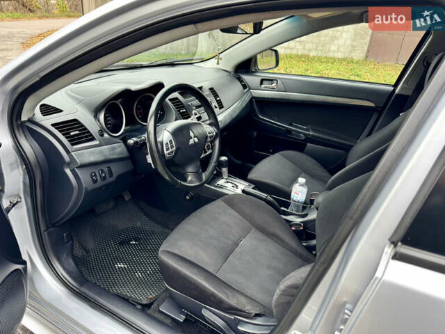 Сірий Міцубісі Lancer, об'ємом двигуна 2 л та пробігом 225 тис. км за 6890 $, фото 8 на Automoto.ua
