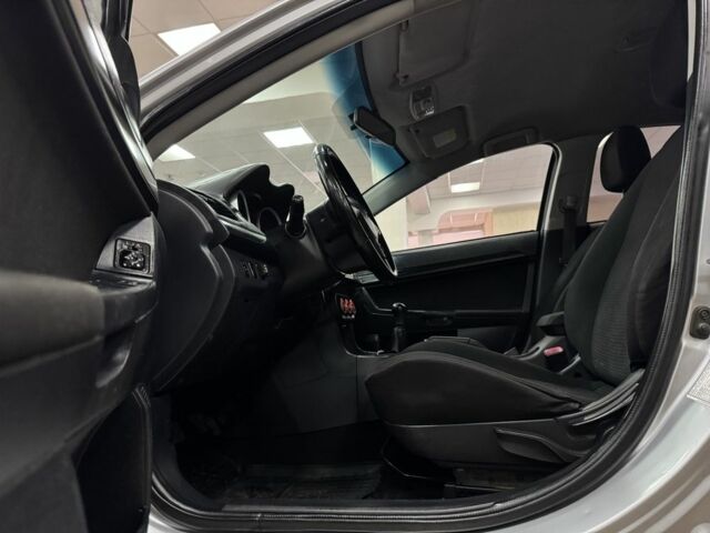 Серый Мицубиси Лансер, объемом двигателя 2 л и пробегом 172 тыс. км за 6300 $, фото 11 на Automoto.ua