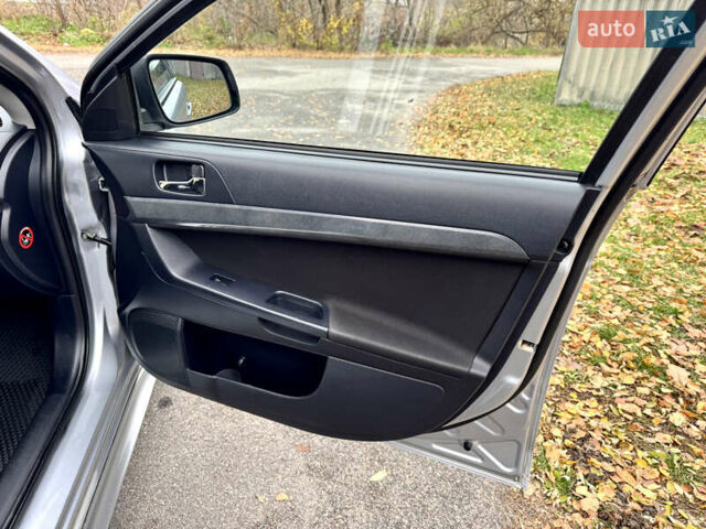 Сірий Міцубісі Lancer, об'ємом двигуна 2 л та пробігом 225 тис. км за 6890 $, фото 17 на Automoto.ua