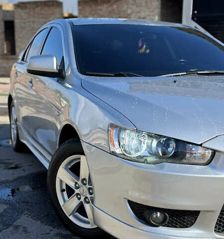 Серый Мицубиси Лансер, объемом двигателя 2 л и пробегом 190 тыс. км за 6900 $, фото 4 на Automoto.ua