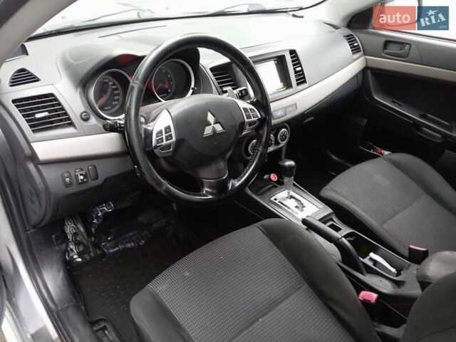 Сірий Міцубісі Lancer, об'ємом двигуна 2 л та пробігом 275 тис. км за 6000 $, фото 4 на Automoto.ua