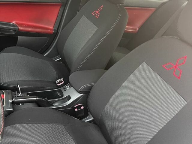 Серый Мицубиси Лансер, объемом двигателя 2 л и пробегом 224 тыс. км за 6500 $, фото 5 на Automoto.ua