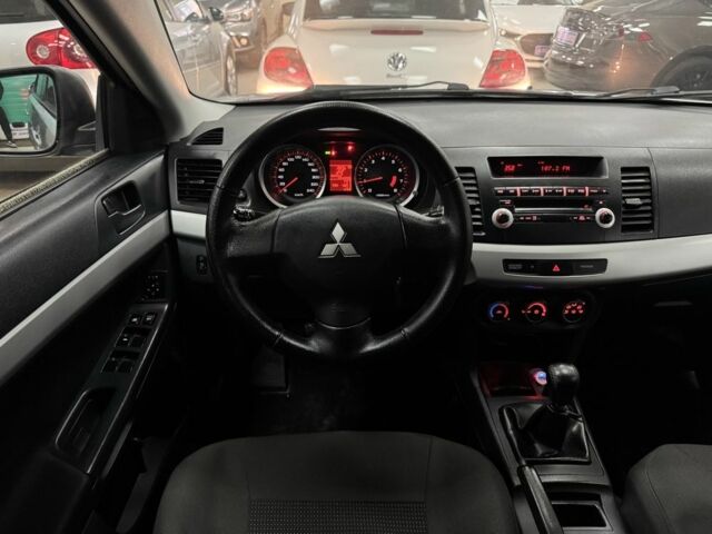 Серый Мицубиси Лансер, объемом двигателя 1.5 л и пробегом 241 тыс. км за 6400 $, фото 11 на Automoto.ua