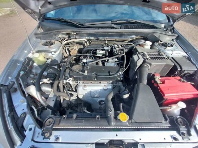 Серый Мицубиси Лансер, объемом двигателя 1.6 л и пробегом 117 тыс. км за 3980 $, фото 7 на Automoto.ua