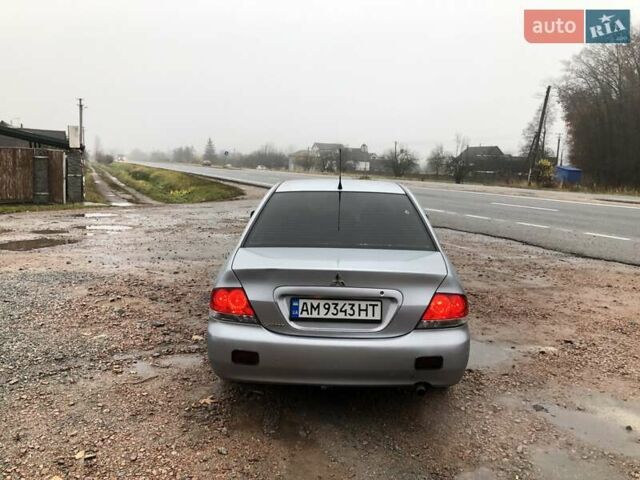 Серый Мицубиси Лансер, объемом двигателя 1.58 л и пробегом 268 тыс. км за 3450 $, фото 2 на Automoto.ua