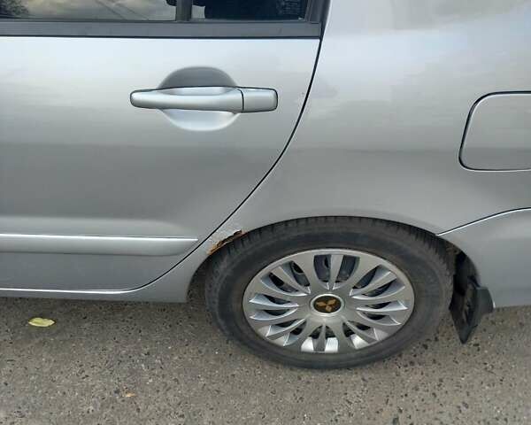 Сірий Міцубісі Lancer, об'ємом двигуна 1.58 л та пробігом 204 тис. км за 3600 $, фото 6 на Automoto.ua