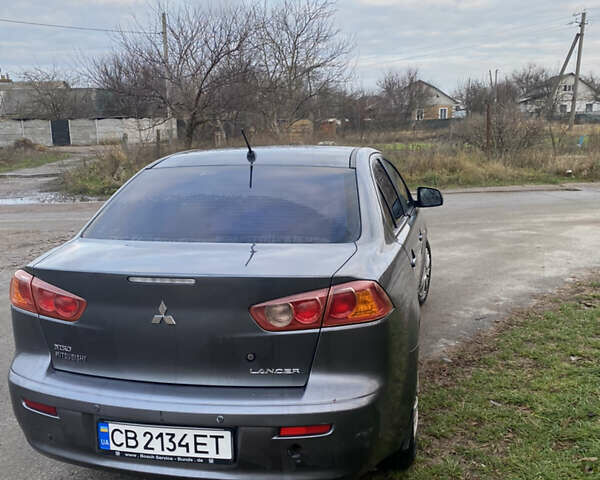 Серый Мицубиси Лансер, объемом двигателя 1.5 л и пробегом 255 тыс. км за 6500 $, фото 9 на Automoto.ua