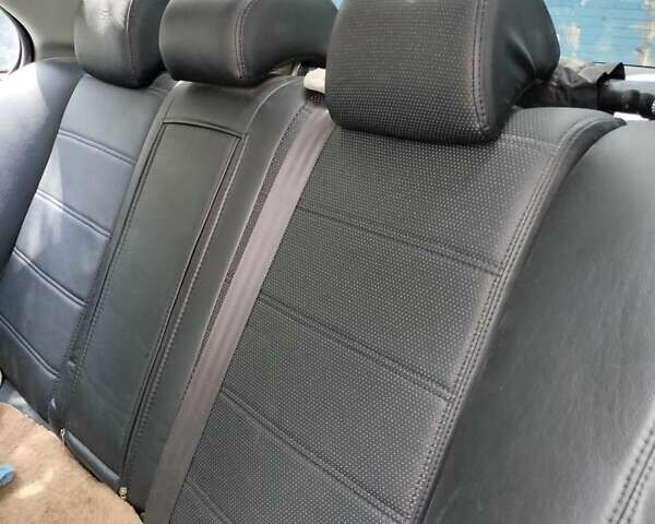 Мицубиси Лансер 2008 в Львове на Automoto.ua Серый Мицубиси Лансер, объемом двигателя 1.9 л и пробегом 294 тыс. км за 6000 $, фото 5 на Automoto.ua