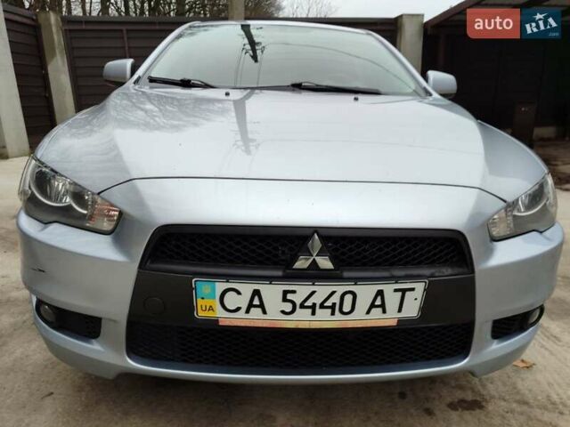 Серый Мицубиси Лансер, объемом двигателя 2 л и пробегом 234 тыс. км за 7200 $, фото 6 на Automoto.ua
