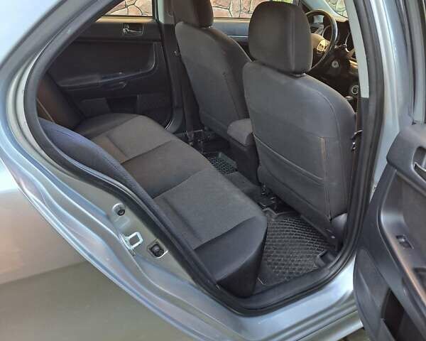 Сірий Міцубісі Lancer, об'ємом двигуна 2 л та пробігом 207 тис. км за 6550 $, фото 6 на Automoto.ua