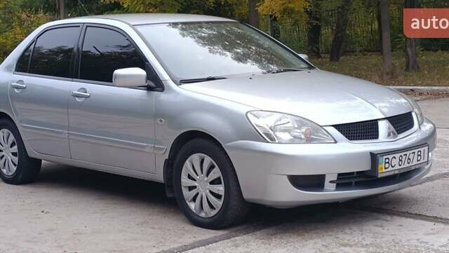 Сірий Міцубісі Lancer, об'ємом двигуна 1.6 л та пробігом 176 тис. км за 4999 $, фото 5 на Automoto.ua
