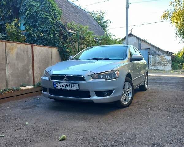 Серый Мицубиси Лансер, объемом двигателя 2 л и пробегом 103 тыс. км за 7700 $, фото 3 на Automoto.ua