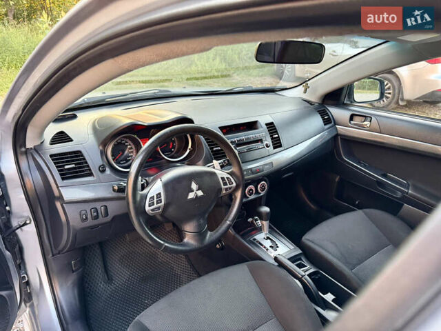Сірий Міцубісі Lancer, об'ємом двигуна 2 л та пробігом 223 тис. км за 7390 $, фото 10 на Automoto.ua