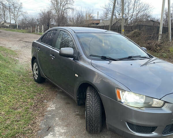 Серый Мицубиси Лансер, объемом двигателя 1.5 л и пробегом 255 тыс. км за 6500 $, фото 3 на Automoto.ua