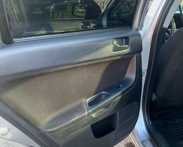 Серый Мицубиси Лансер, объемом двигателя 1.5 л и пробегом 160 тыс. км за 5300 $, фото 8 на Automoto.ua