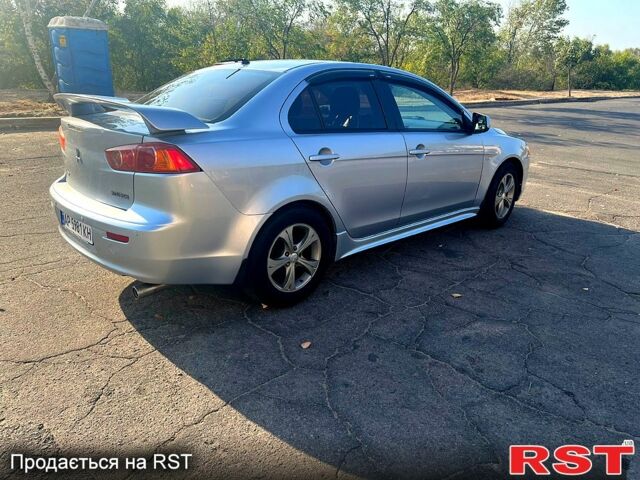 Серый Мицубиси Лансер, объемом двигателя 2 л и пробегом 151 тыс. км за 6099 $, фото 5 на Automoto.ua