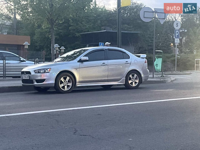 Серый Мицубиси Лансер, объемом двигателя 2 л и пробегом 265 тыс. км за 5500 $, фото 13 на Automoto.ua