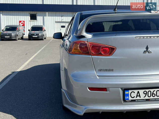 Сірий Міцубісі Lancer, об'ємом двигуна 2 л та пробігом 237 тис. км за 7200 $, фото 19 на Automoto.ua